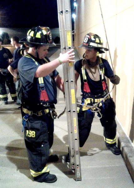 Back to Basic. Brushing up on placing ladders. Training save lives. 8/25/2014.
Photo by Vincent P. Tuzzolino