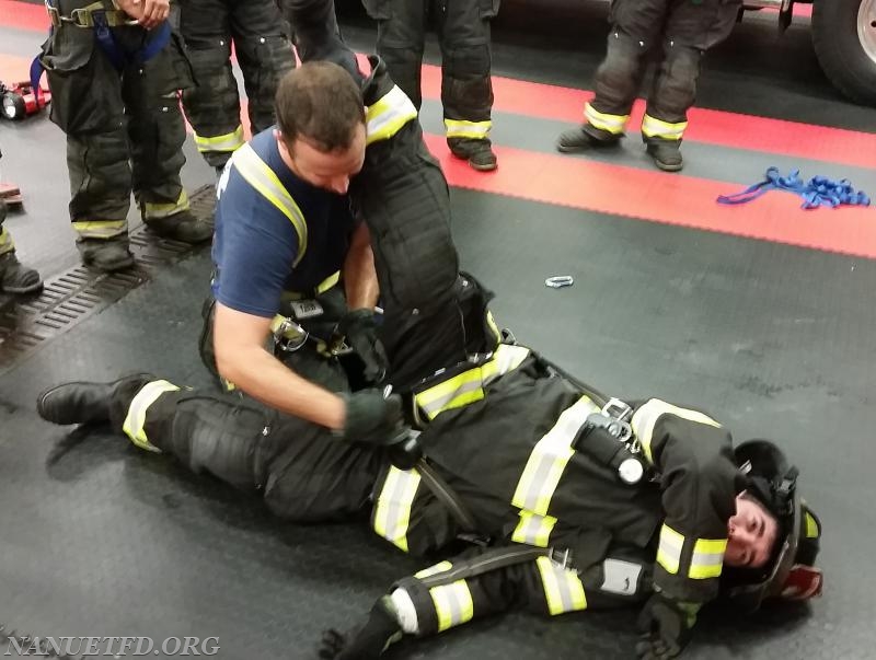 Lt. Parker doing F.A.S.T team training. Getting a downed firefighter out. Training save lives. Photos by Vincent P. Tuzzolino. 10/9/2017
