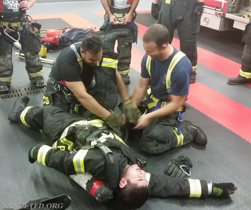 Lt. Parker doing F.A.S.T team training. Getting a downed firefighter out. Training save lives. Photos by Vincent P. Tuzzolino. 10/9/2017