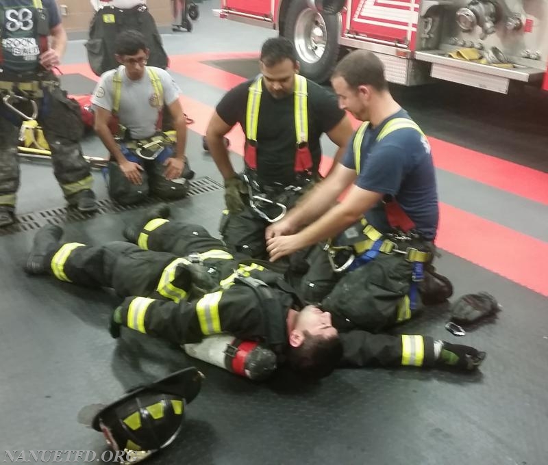 Lt. Parker doing F.A.S.T team training. Getting a downed firefighter out. Training save lives. Photos by Vincent P. Tuzzolino. 10/9/2017