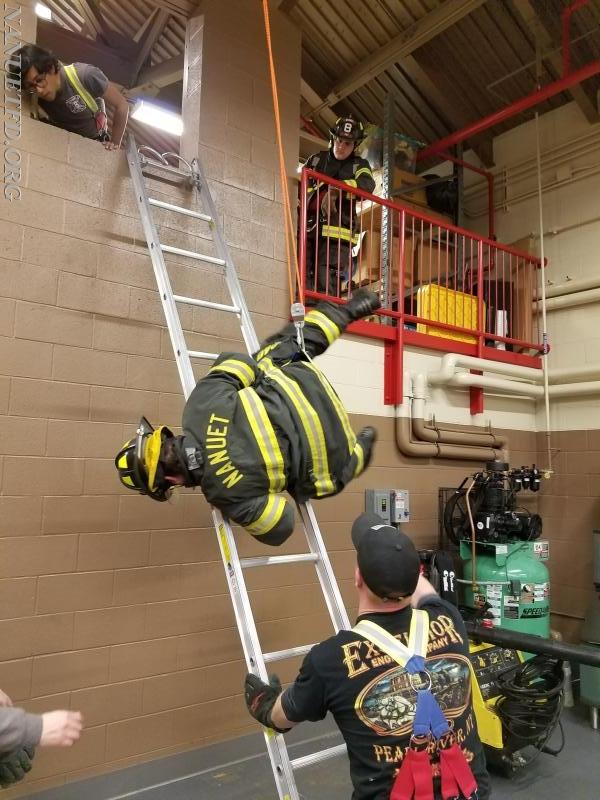 Placing ladders, firefighter egress and bail out training. Photos by Vincent P. Tuzzolino, Drill ran by 8-2 BJ Ready.
