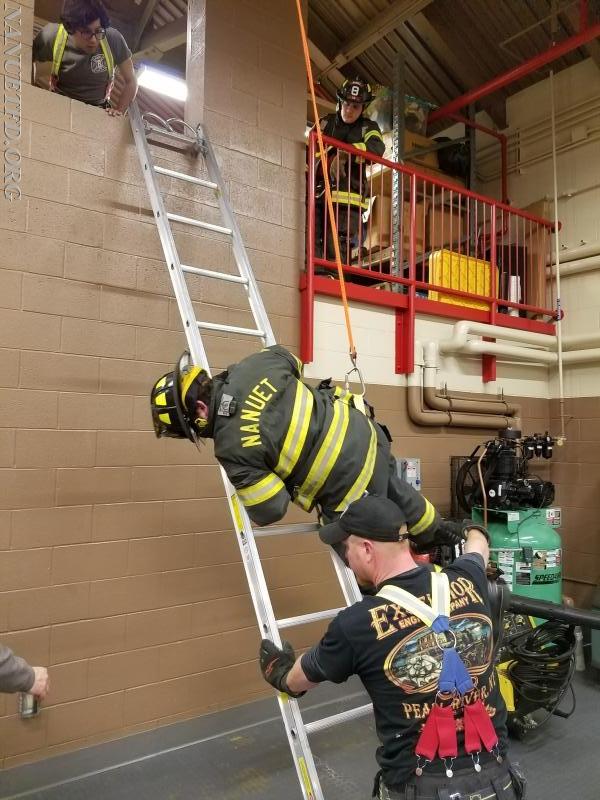 Placing ladders, firefighter egress and bail out training. Photos by Vincent P. Tuzzolino, Drill ran by 8-2 BJ Ready.