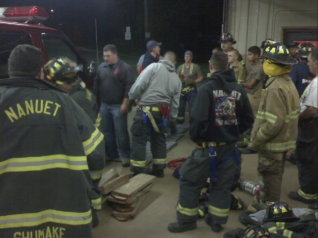 Lt. Giraudin and Lt. Ready teach new members how to use rescue air bags to free a victim trapped under a vehicle. Nanuet Firehouse, 10/27/08