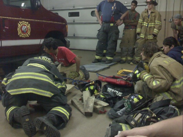Lt. Giraudin and Lt. Ready teach new members how to use rescue air bags to free a victim trapped under a vehicle. Nanuet Firehouse, 10/27/08