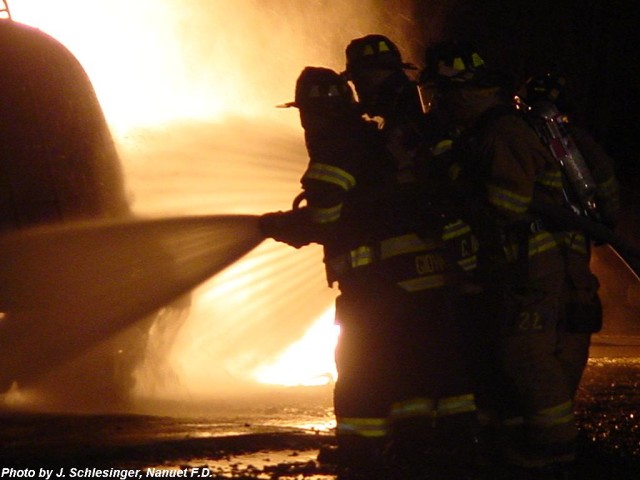 Commissioner & Safety Officer Domenick Giovinazzo on the nozzle.  Oil Pits Drill, FTC, 4/28/03