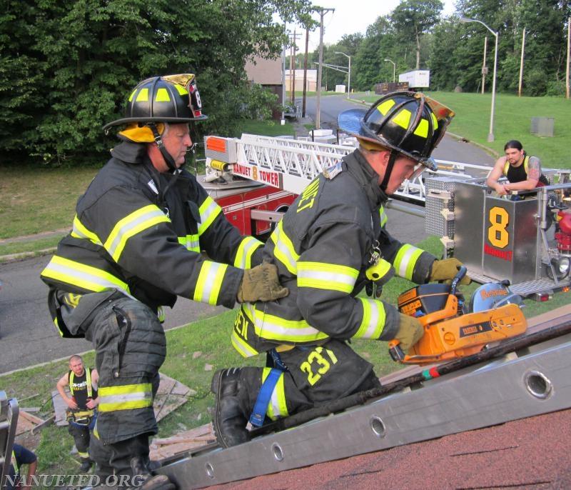 Roof Prop. FTC. Yes its hot but we also fight fires in the summer. Nanuet Fire Department prides its self on being well Trained. Training Saves Lives.
Photo By Vincent P. Tuzzolino 7-20-2015
