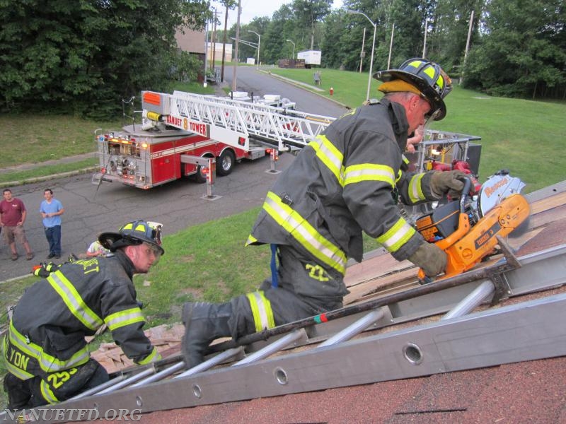 Roof Prop. FTC. Yes its hot but we also fight fires in the summer. Nanuet Fire Department prides its self on being well Trained. Training Saves Lives.
Photo By Vincent P. Tuzzolino 7-20-2015