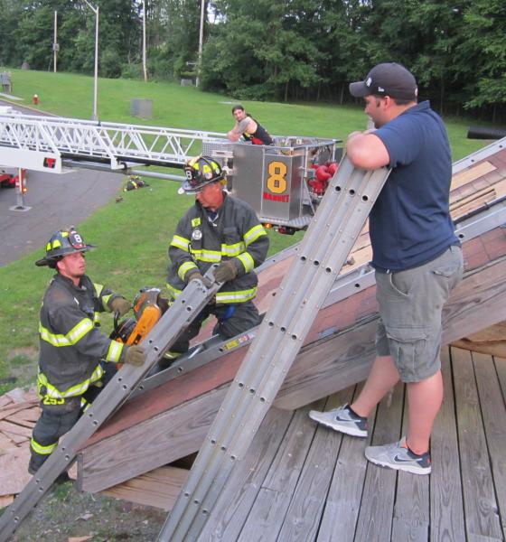 Roof Prop. FTC. Yes its hot but we also fight fires in the summer. Nanuet Fire Department prides its self on being well Trained. Training Saves Lives.
Photo By Vincent P. Tuzzolino 7-20-2015