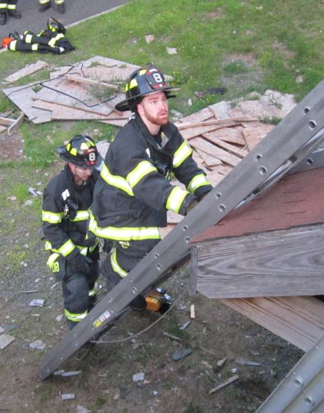 Roof Prop. FTC. Yes its hot but we also fight fires in the summer. Nanuet Fire Department prides its self on being well Trained. Training Saves Lives.
Photo By Vincent P. Tuzzolino 7-20-2015