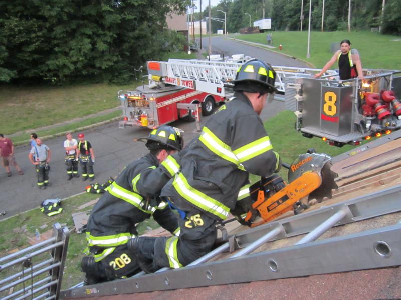 Roof Prop. FTC. Yes its hot but we also fight fires in the summer. Nanuet Fire Department prides its self on being well Trained. Training Saves Lives.
Photo By Vincent P. Tuzzolino 7-20-2015